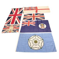 Six flags - White Ensign 180 x 86cm; two Union flags 180 x 86cm and 132 x 62cm; Falklands Islands 153 x 89cm; Yorkshire Rose 153 x 89cm; and QEII 1953 Coronation 84 x 57cm (6)