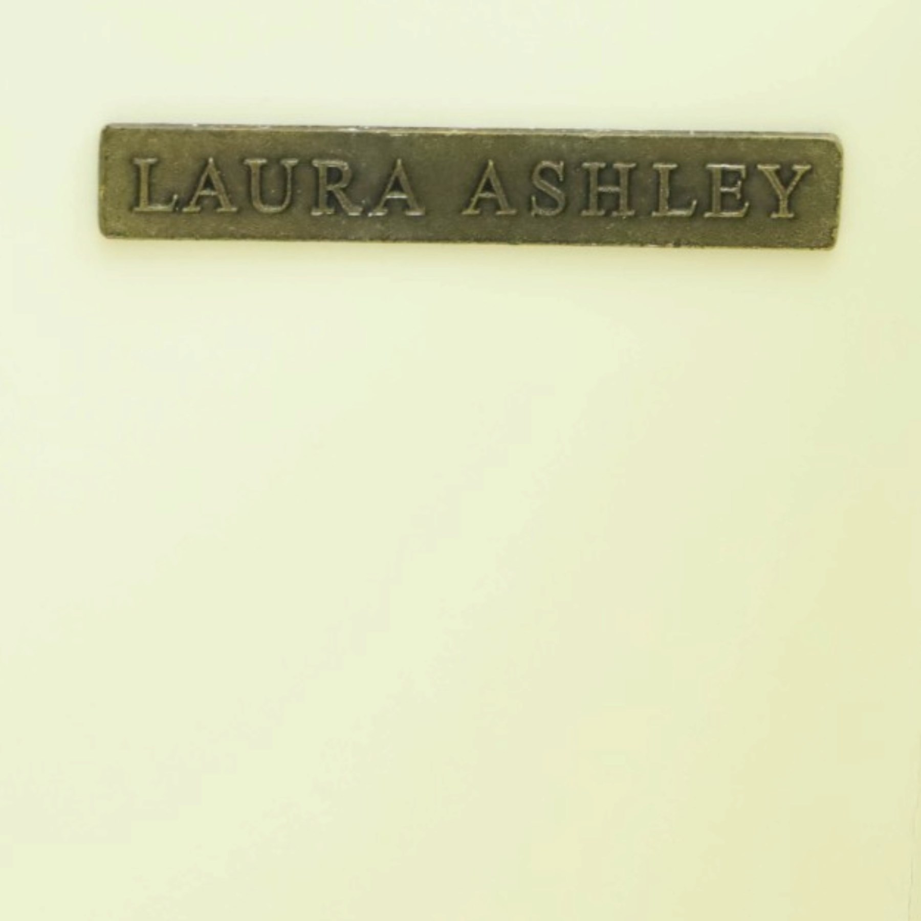 Laura Ashley - 'Clifton' bedside chest, fitted with three graduating drawers flanked by half-canted pilasters, raised on turned feet, in ivory finish
