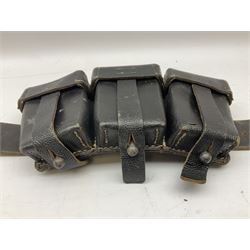 WW2 German 'SS' leather belt with six pouches (one containing unused field bandage) and buckle inscribed 'Meine Ehre Heifst Treue'; belt marked 0/0836 0029