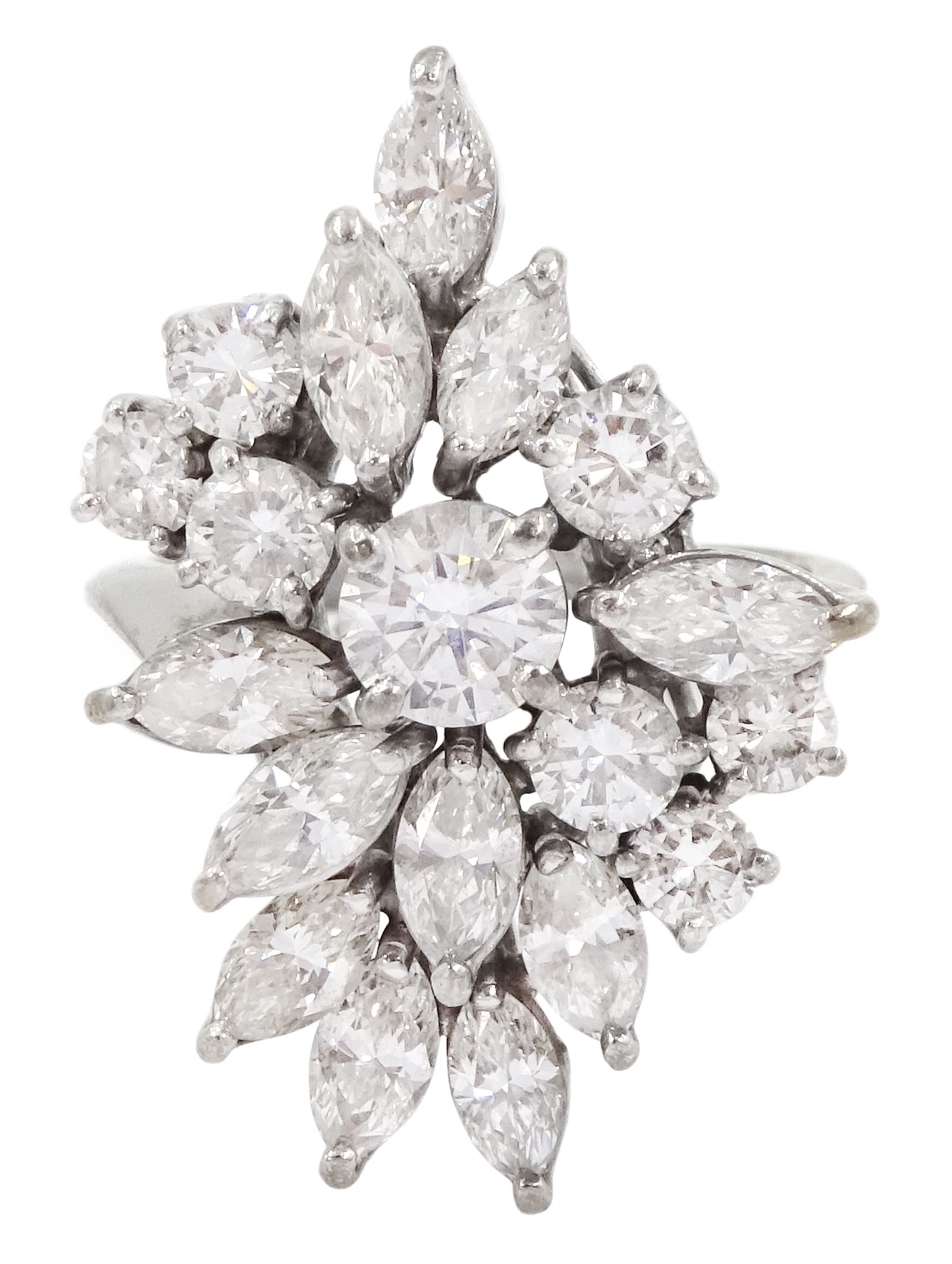 18ct white gold round brilliant cut and marquise cut diamond, stepped design cluster ring, London 1975, total diamond weight approx 3.10 carat