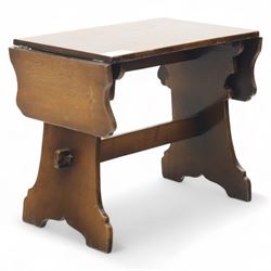 Early 20th century oak drop leaf cottage table, rectangular top with twin hinged leaves, o...