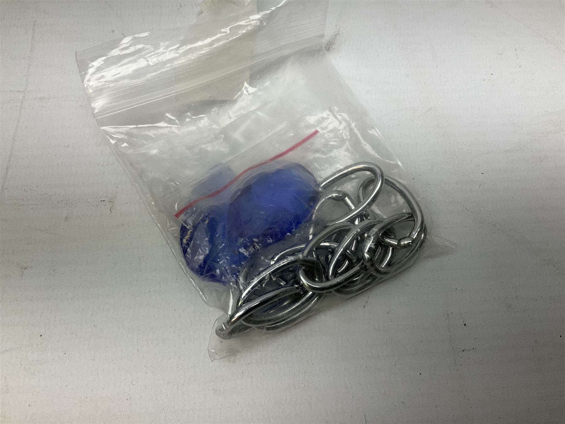 Glass four light chandelier, the baluster shaped central glass column supporting four curved branches with drip pans and blue glass drops, approx height excl fitting H50cm