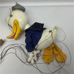 Two Pelham Puppets - The Magic Roundabout Mr. Rusty pole puppet with wool hands and blue  coat dated 1963; boxed; and Type SL Disney Donald Duck; unboxed (2)