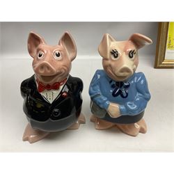  Full Set of Wade Natwest Pigs to include cousin Wesley, with an additional baby and framed leaflet 