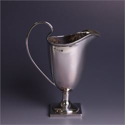 Edwardian silver helmet shaped cream jug, with plain bowl and upon a square base, hallmarked D & M Davis , Chester 1901, H13cm