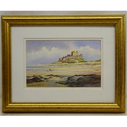  Kenneth W Burton (British 1946-): 'Bamburgh Castle Northumberland', watercolour signed and titled 13cm x 21cm Provenance: from 'The Counties of Great Britain Collection', certificate verso  