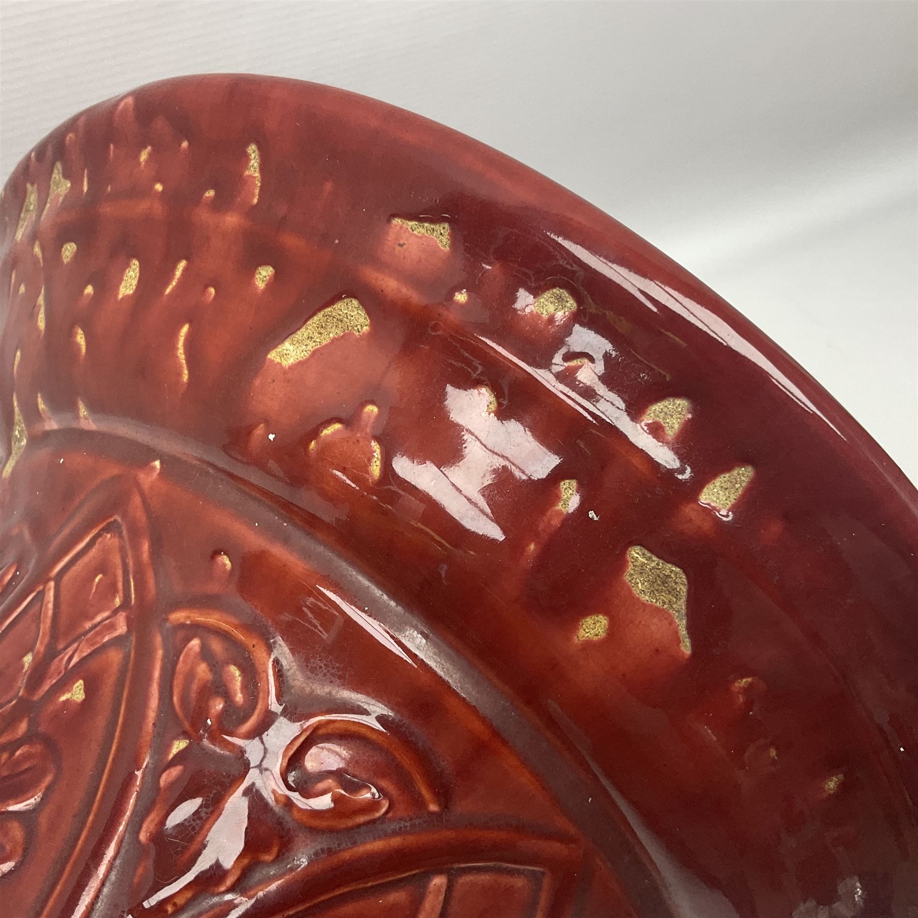 Bretby Jardiniere and stand, with foliate and foliage decoration with a red and yellow ground, impressed mark beneath H94cm
