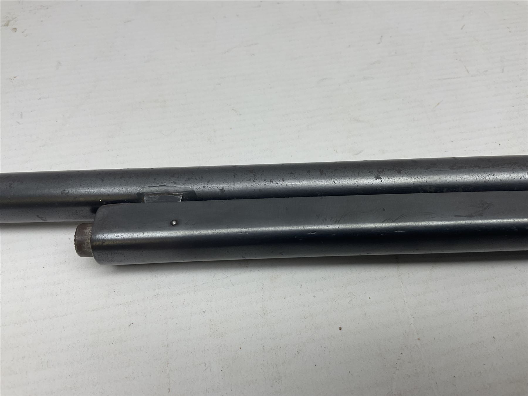 Early 20th century BSA Standard .177 Cal. Air Rifle (No.1), early A prefix number A67, with blued finish, top-loading, push-button underlever action, walnut semi-pistol grip stock with chequered BSA logo L101cm overall; with contemporary canvas case; NB: AGE RESTRICTIONS APPLY TO THE PURCHASE OF AIR WEAPONS.