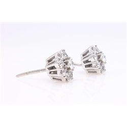  Pair of 18ct white gold diamond cluster ear-rings, (tested) approx 1 carat total  