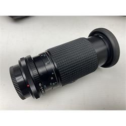 Canon A1 35mm camera body serial no 741264, with 'Tokina AT-X 28-85mm 1:3.5-4.5' lens serial no 821679, 'Canon FD 50mm 1:1.8mm' lens and other camera equipment 