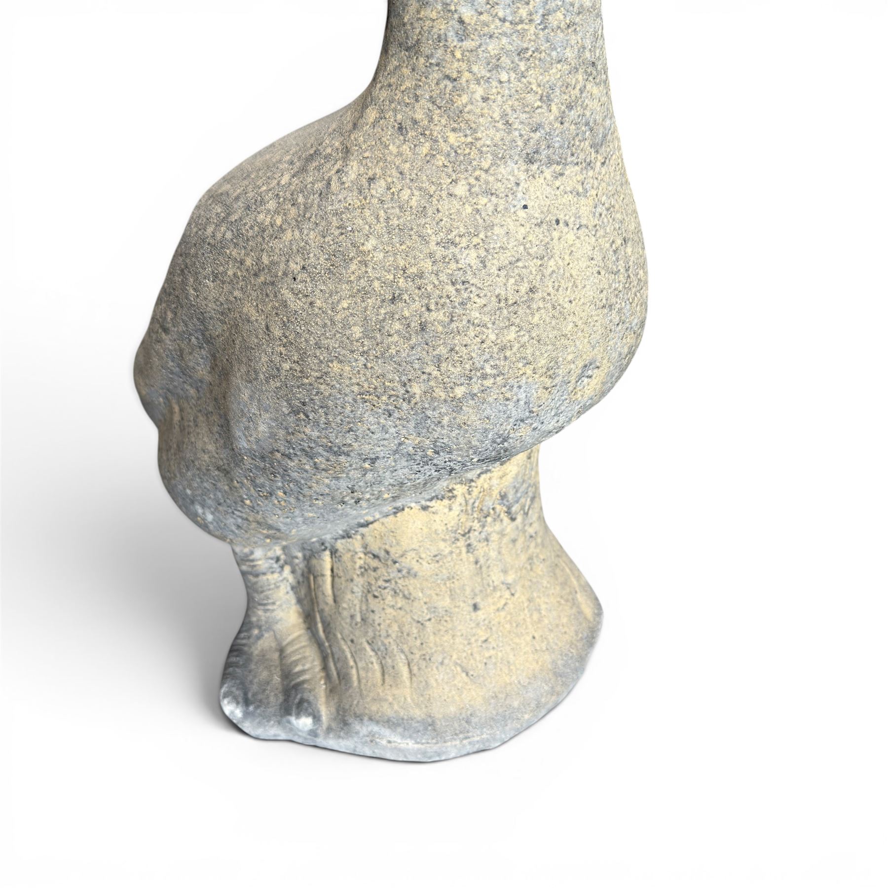 Large cast stone garden statue modelled as a standing goose on a naturalistic base