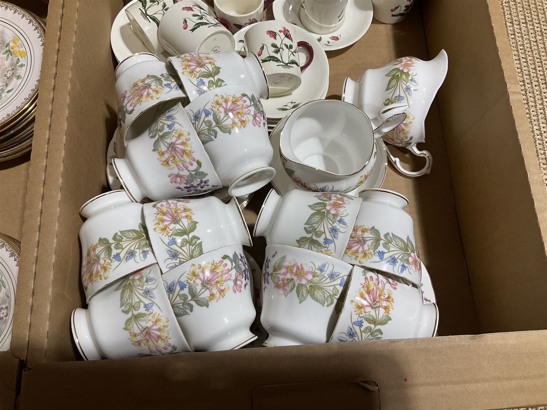 Paragon tea wares decorated in the 'Country Lane' pattern, Plant Tuscan tea set for nine, the pink ground with flower and gilt decoration, Wedgwood 'Mayfield' coffee wares etc in two boxes
