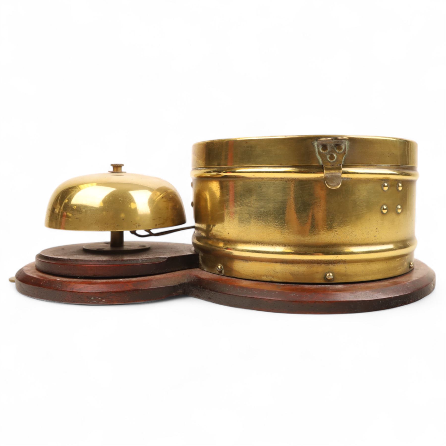 Seth Thomas U.S.A. Ships clock, circa1890, silvered dial with Roman numerals, steel spade hands and subsidiary seconds dial, with a circular alloy drum case mounted on a wooden plaque