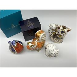 Four Royal Crown Derby paperweights, comprising Autumn Squirrel, with box, Dormouse, with box, Robin, and Koala and baby, all with gold stoppers. 