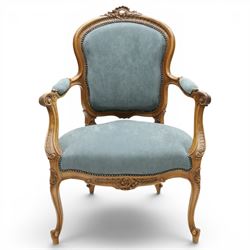 Louis XV design giltwood open armchair, shaped upholstered back with carved foliate cresting, padded scroll arms and serpentine seat upholstered in pale blue fabric with studwork, moulded and foliate carved frame, on cabriole supports with scroll feet