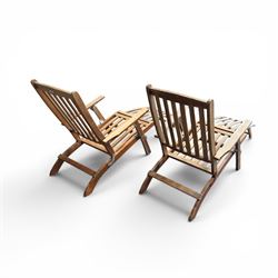 Pair of teak folding steamer chairs, with slatted backs, seats and extending footrests, adjustable recline.