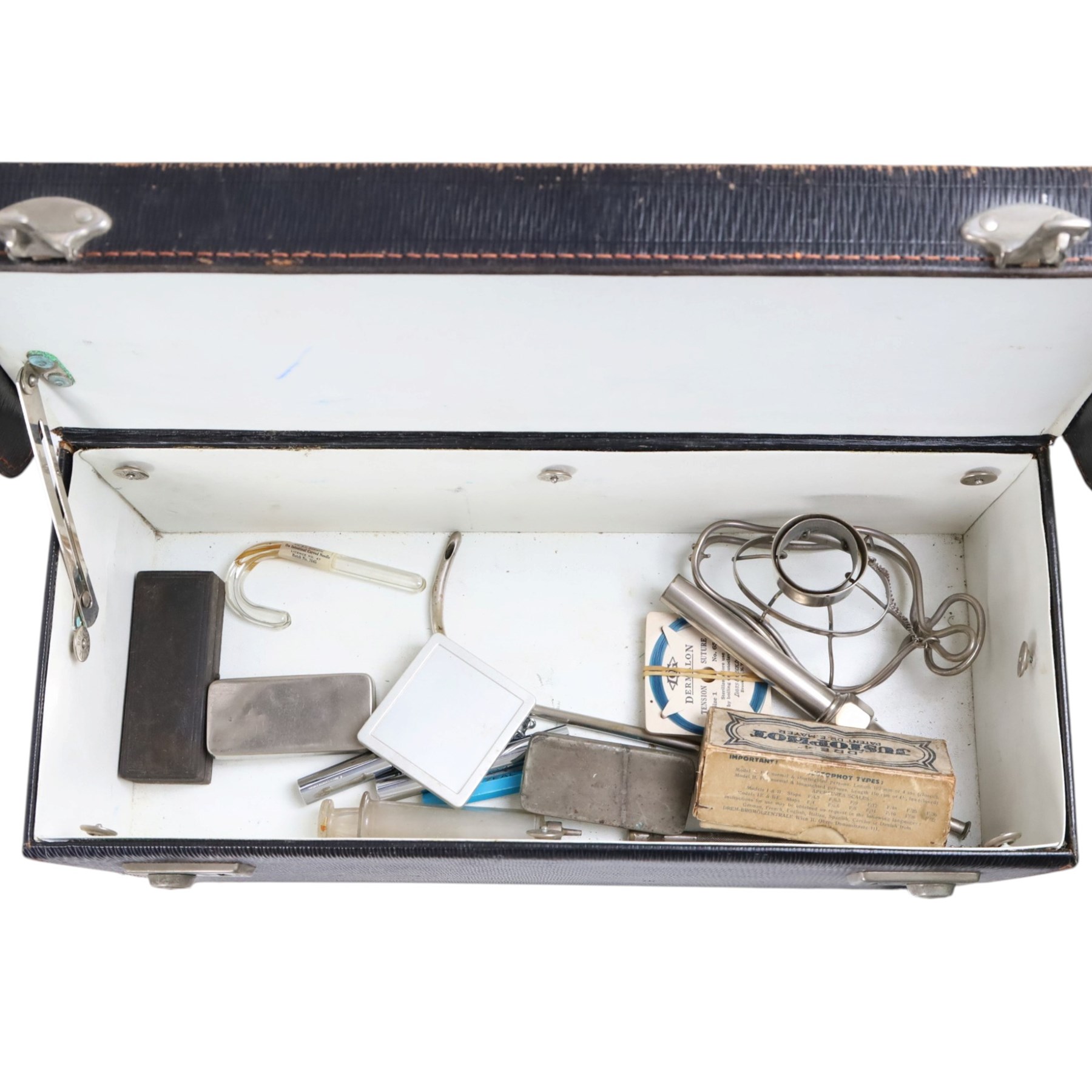 Collection of early 20th century and later medical equipment, including portable inhaler, tonsil guillotine, aspirator, steel catheter set, etc, in leather boxes
