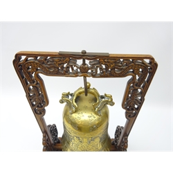  Early 20th century Chinese Temple Gong with brass bell shaped gong decorated with figures & moulded Dragon handle, within a finely carved frame modelled as two opposed dragons chasing the flaming pearl H44.5cm x W24cm   