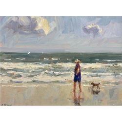 Christine M Pybus (British 1954-): Figure and Dog on the Beach, oil on board signed 15cm x 20cm