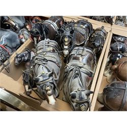 Approximately forty seven ceramic Shire horses to include Sylvac and Melba Ware examples of various sizes and colours, many with harnesses, and a quantity of carts and wagons 