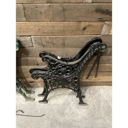 Four pairs of ornate cast iron bench ends (8)