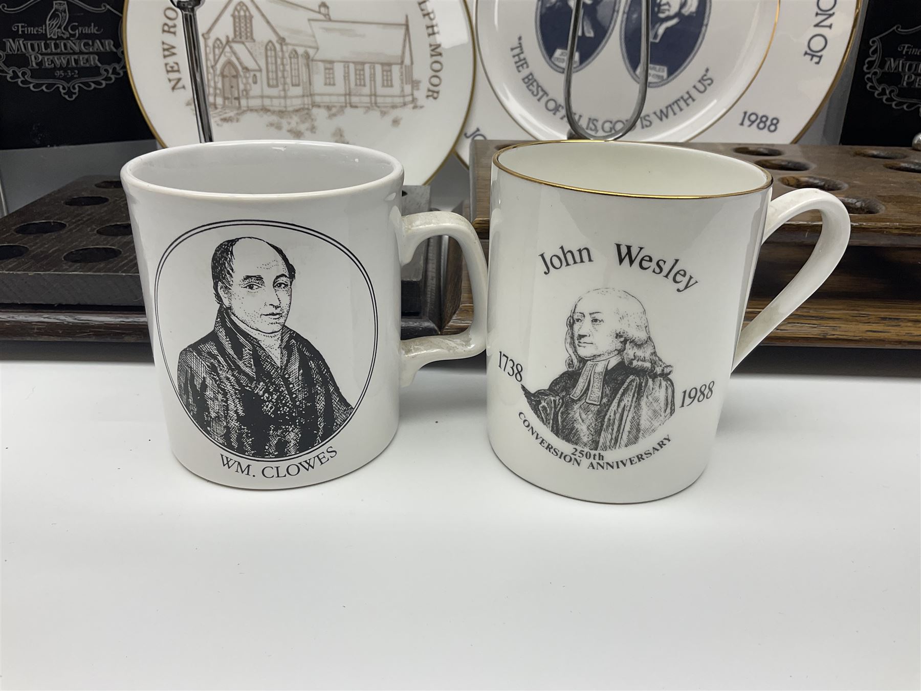 Collectables relating to the Methodist Church, including plates, goblet and mugs commemorating the 250th anniversary of the church, together with two wooden communion cup holders, etc