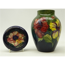  Mid 20th century Moorcroft Hibiscus pattern vase, impressed marks to base, H18cm and a Moorcroft Anemone dish with inverted rim, impressed 'Potter To H.M. The Queen', D11.5cm (2)  