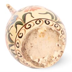 Iznik-style ewer, late 19th/early 20th century, the ovoid body painted with stylized flowers upon a cream ground, the neck with repeating scrolling boarder, H28cm
