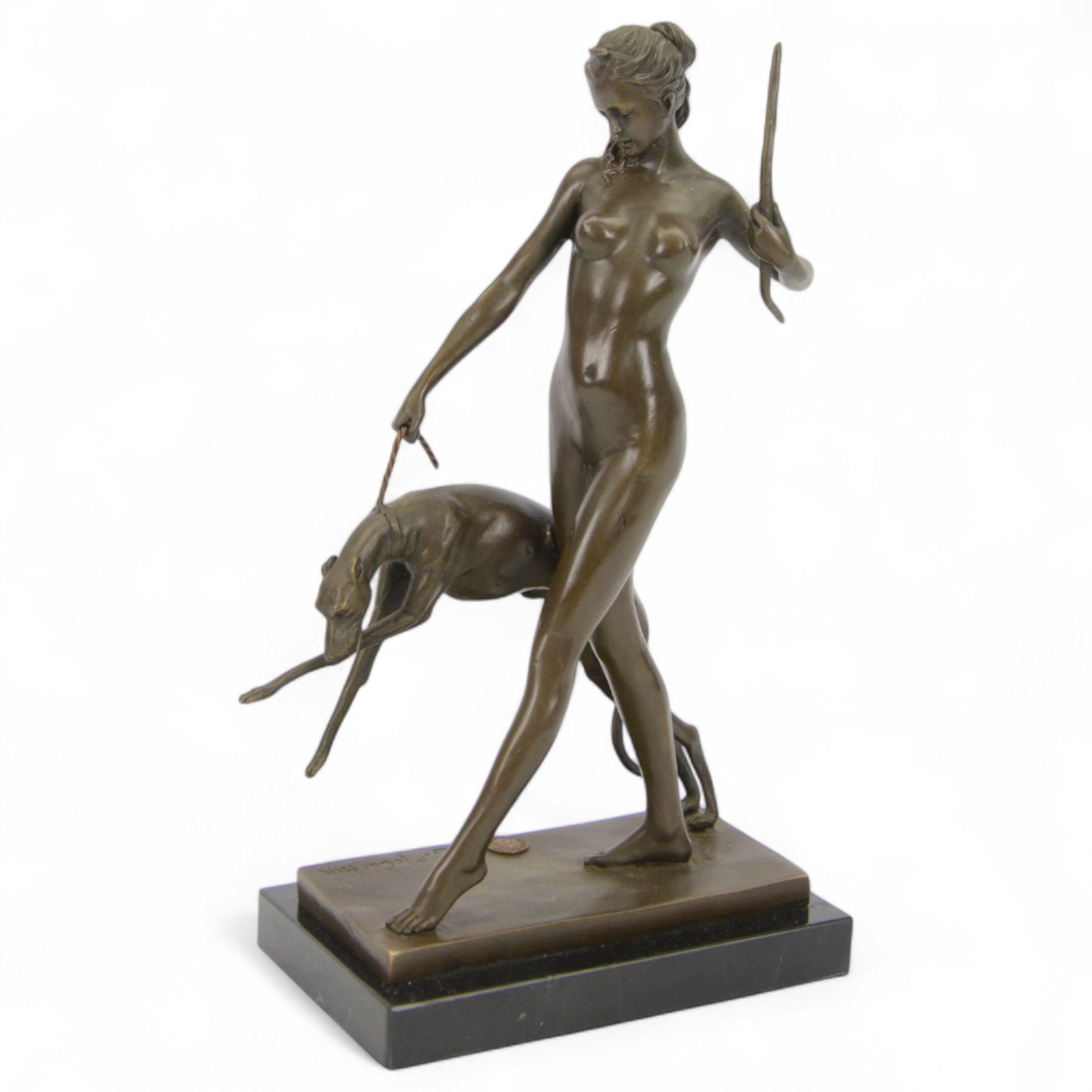 After Edward McCartan, Art Deco style bronze figure, Diana and the Hound upon a marble base, signed and with foundry mark, H31cm