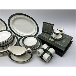Wedgwood dinner service, twelve place mats and six coasters consisting of dinner plates, side plates, soup plates, bowls, six espresso cups and saucers for six,Two serving platters, two vegetable serving dishes, two serving dishes with lids, one gravy boat and saucer 