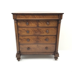  Victorian figured mahogany Scotch chest, single frieze drawer above two short and three long drawers flanked by two columns on turned supports, W124cm, H138cm, D59cm  