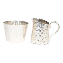 Hukin & Heath planished silver plate coffee tray attributed to Christopher Dresser, with similar coffee set comprising pair of coffee pots, of cylindrical tapering form with strapwork handles, milk jug and open sucrier, all engraved with initial to center, tray L48cm 