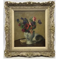 Henry Marvell Carr (British 1894-1970): Still Life of Flowers in Blue and White Vase, oil on canvas signed and dated '46, 39.5cm x 34.5cm 