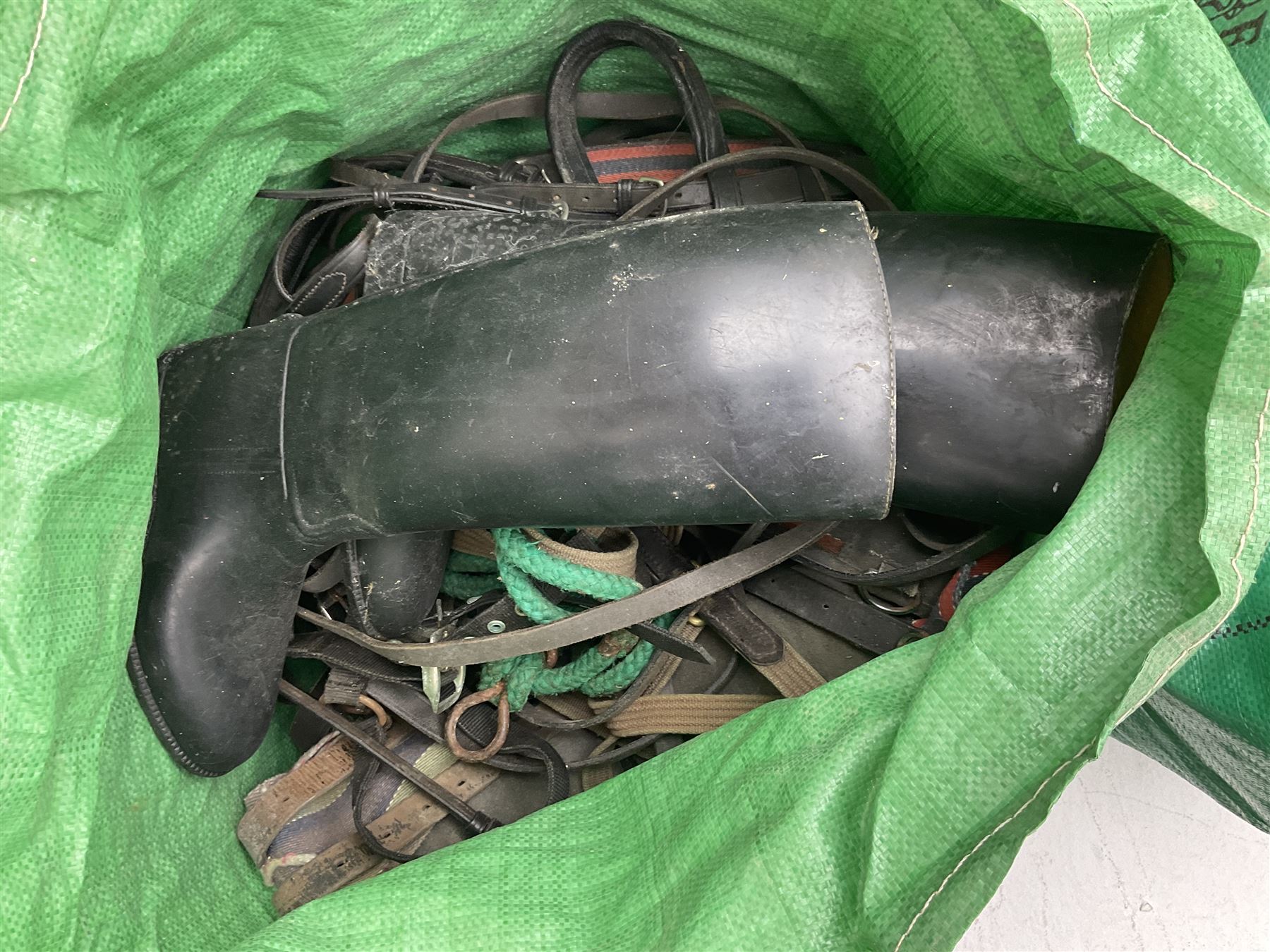 Quantity of horse tack to include bits, bridles, lunging equipment, brushing boots, tail guards, jodpa boots etc  
