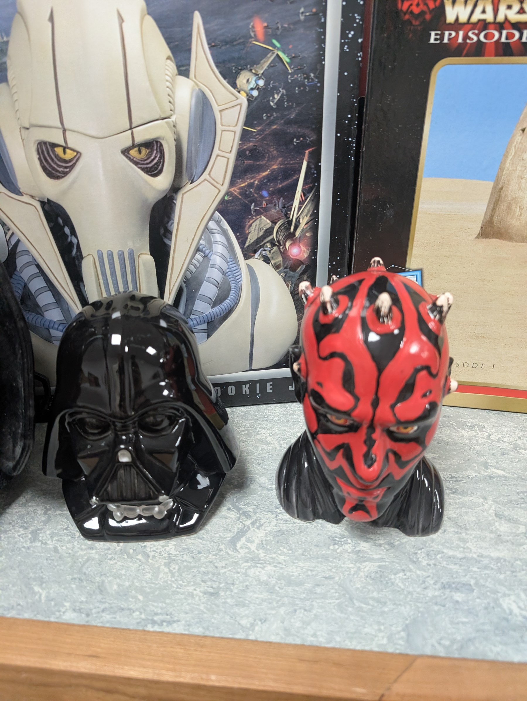Star Wars collectables, including Neca General Grievous cookie jar,R2-D2 telephone, Episode I chess set, puzzle, Darth Vader back pack and two money boxes