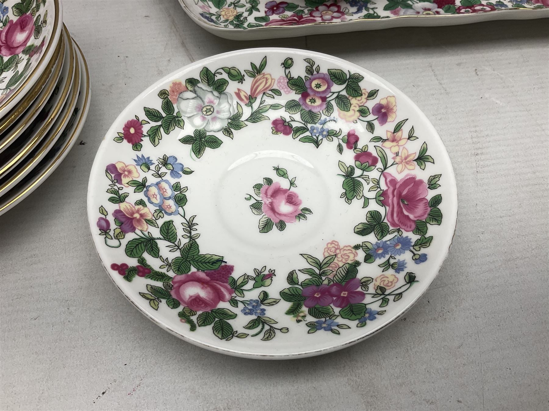 Crown Staffordshire Thousand Flowers pattern part tea service, to include teapot, two open sucriers, eighteen cups, fifteen saucers etc (57)