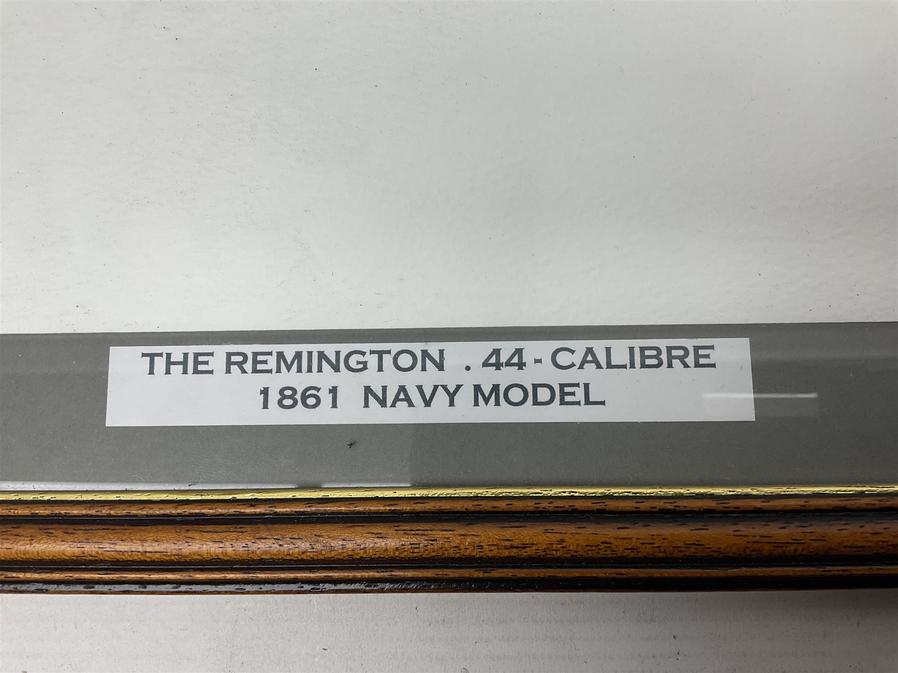 Unmarked Spencer & Rogers type Remington style .44 cal. six-shot percussion revolver, 20cm octagonal barrel with loading lever under, brass trigger guard and two-piece wooden grip L37cm overall; together with a framed watercolour by Alan J. Gray dated 2009 entitled 'The Remington .44 Calibre 1861 Navy Revolver'  19 x 42cm (2)