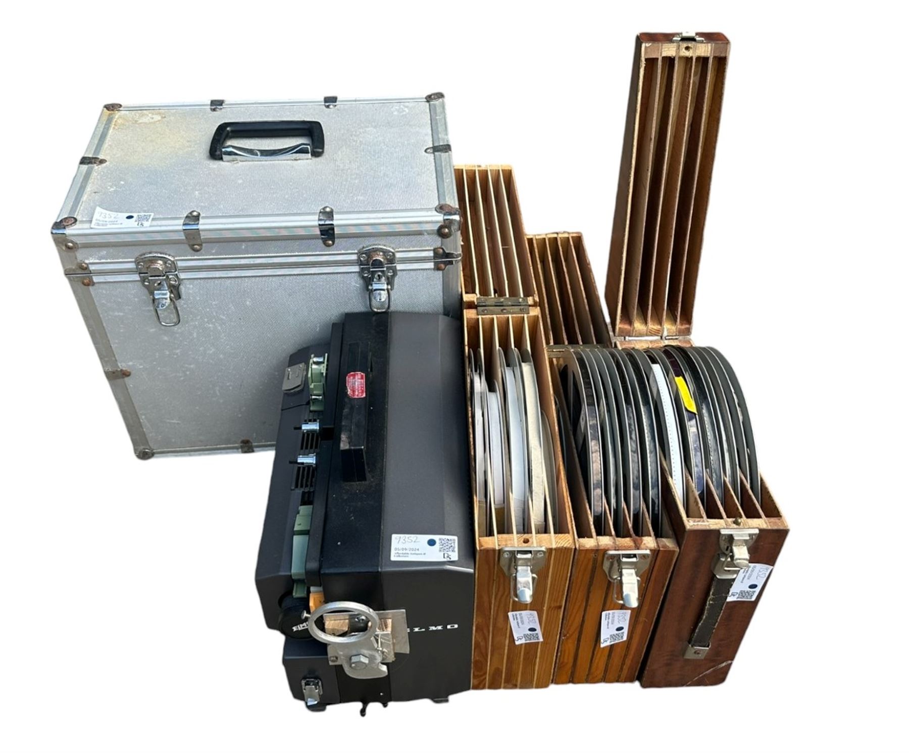  Elmo GS-1200 projector, cased, with three cases of reels 