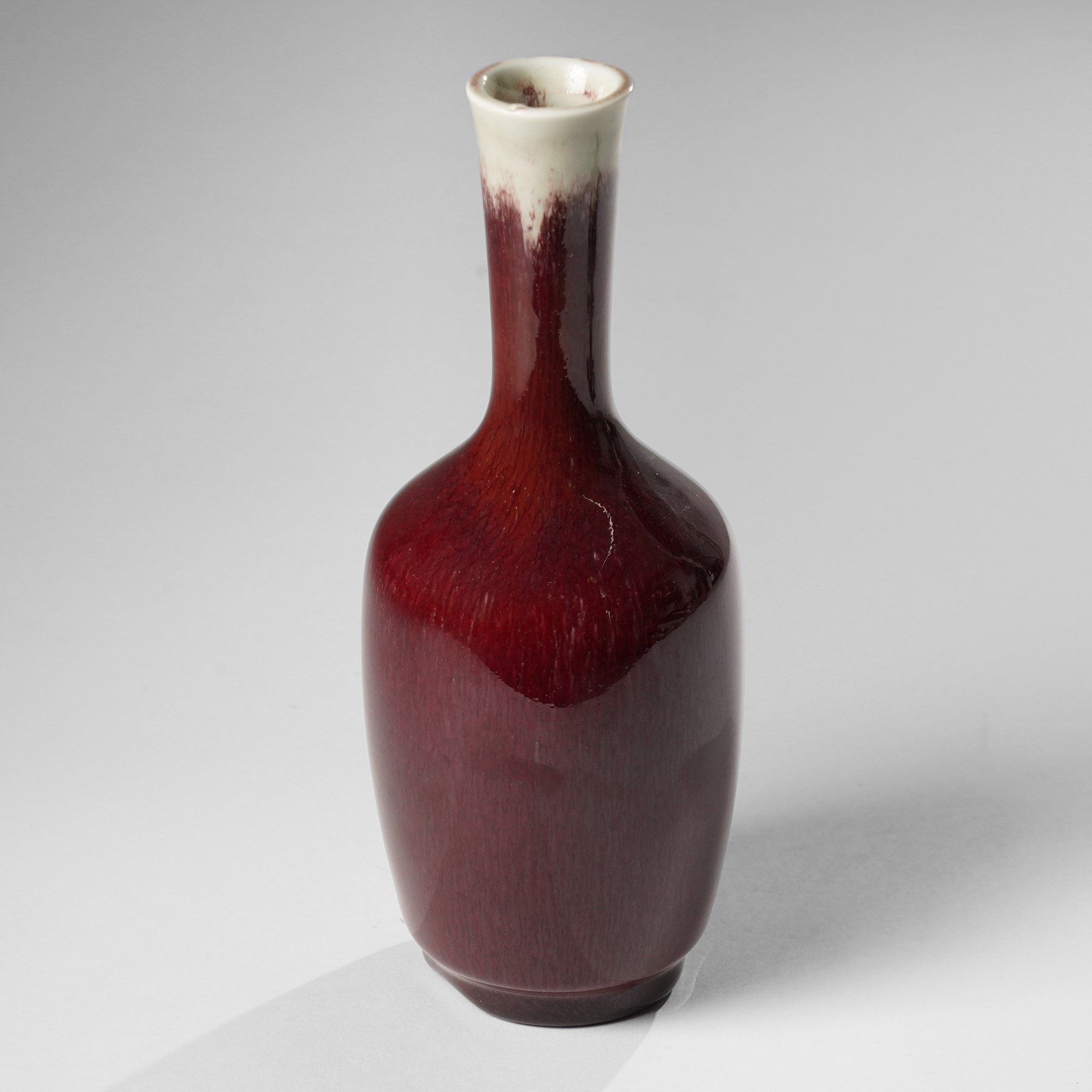 Chinese sang de boeuf bottle vase, H21cm