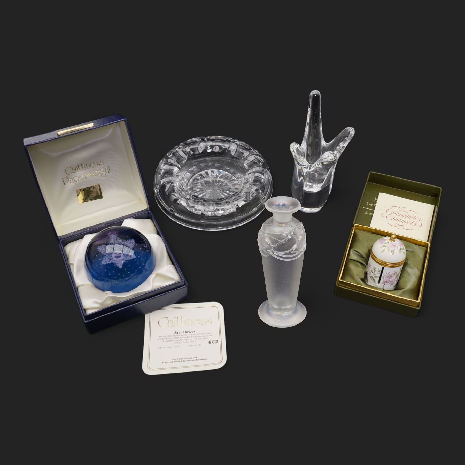 David Wallace iridescent glass vase, H14cm, French Sevres glass vase, Caithness 'Star Flower' paperweight, Crummles enamel label holder and a Stuart crystal ashtray (5)