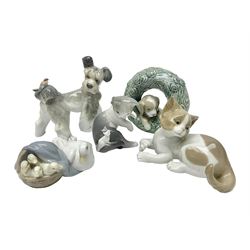 Five Lladro figures, comprising Puppy no 8071, Unexpected visit no 6829, Cat and Mouse no 5236, Surprised Cat no 5114 and Ducks no 4895