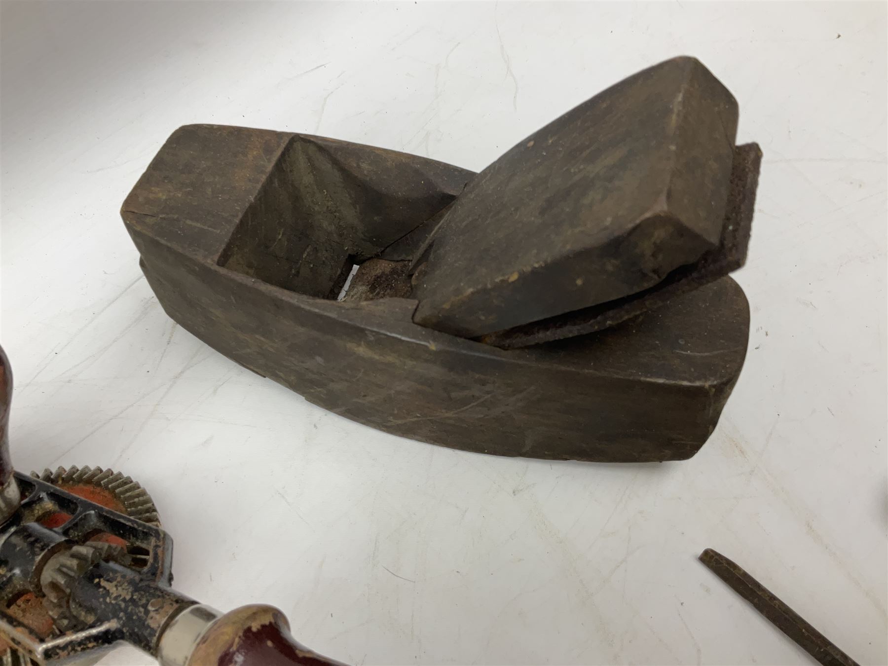 Quantity of woodworking tools, comprising hand drills to include Stanley No. 803 and No. 5803, Qualcast Clipper etc, together with collection of planes to include moulding examples and rebate plane of stepped form, and further tools including chisels etc