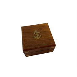 Nautical brass sundial compass marked F. L. West, London, with wooden box, and a vintage AA car badge (no. 2E28777)