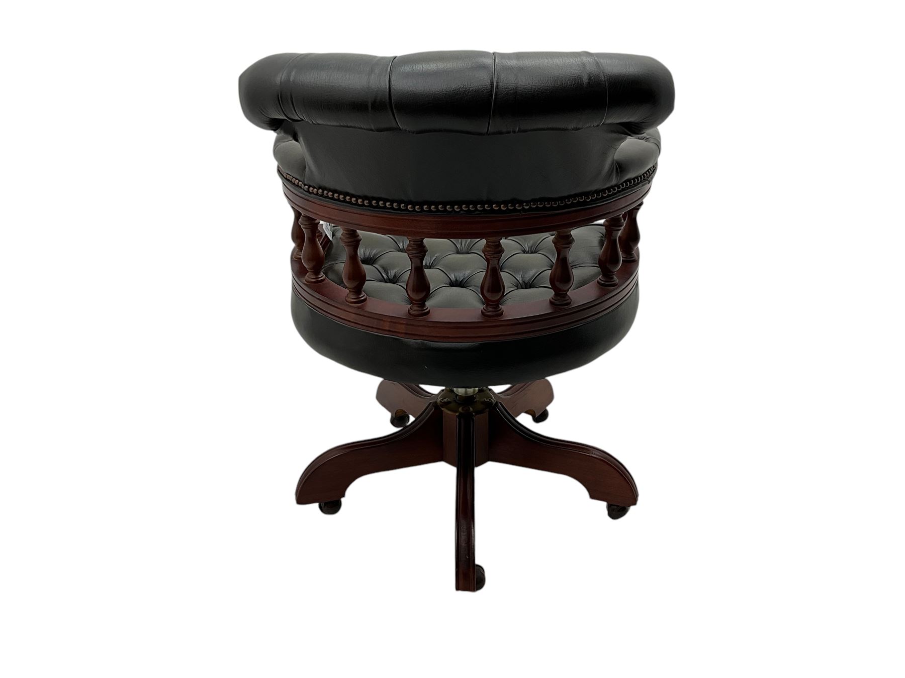 Captain's swivel desk chair, upholstered in studded green leather