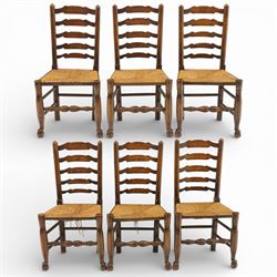 Early 19th century set of six country ladder back chairs, each with five shaped horizontal...