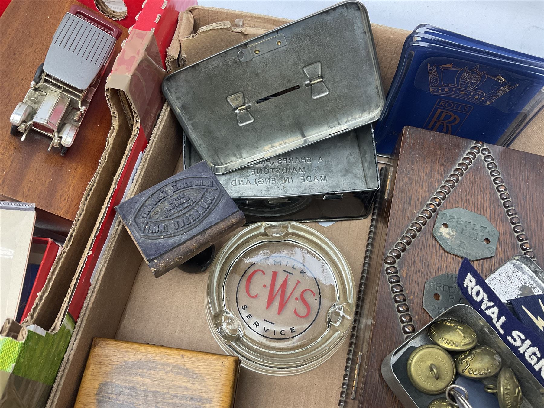 20th century brass perpetual desk calendar of triangular form, together with Mauchlin ware box (a/f), olive wood box, box with beaded decoration, other treen etc, Lesney Model of Yesteryear ashtray limited edition 1911 Renault and another similar, Royal Signals Corps buttons, motor ephemera, other misc 