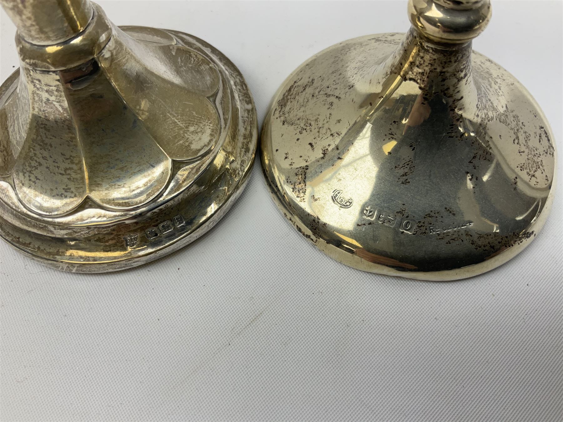 Early 20th century silver mounted specimen vase, of fluted tapering form, hallmarked Sheffield 1915, H18cm, together with a further silver mounted specimen vase, hallmarked for Birmingham, (2)