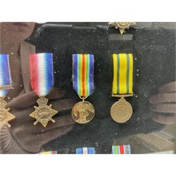 Limited edition large framed display board with sixty half-size copies of British Gallantry and Campaign Medals produced by Danbury Mint; all with ribbons and associated booklet