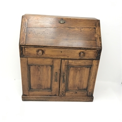 19th century stained pine bureau, fall front enclosing fitted interior, single drawer above two cupboards, plinth base, W94cm, H104cm, D47cm