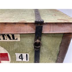 WW2 British Army RAMC 'Regimental Medical Pannier', well marked externally and dated 1941, stamped May 1943 internally, canvas covered wicker form with leather edges, hinged top and fall front with two rope carrying handles, fitted iron locking straps with securing chains; contains various unused field dressings and bandages with WW2 dates and two pillows; original label under lid L79cm